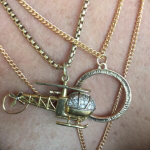 Introducing our exquisite Gold 18k Helicopter Pendants, crafted to perfection for aviation enthusiasts. These bespoke pendants are a testament to meticulous craftsmanship and a passion for flight.