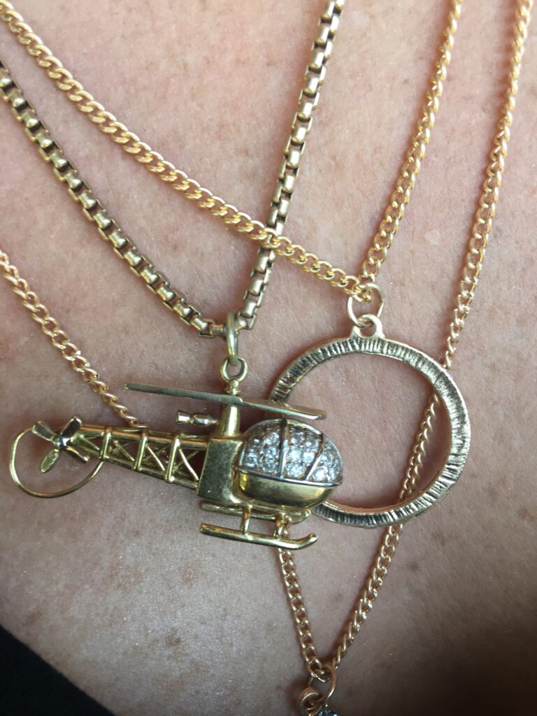 Introducing our exquisite Gold 18k Helicopter Pendants, crafted to perfection for aviation enthusiasts. These bespoke pendants are a testament to meticulous craftsmanship and a passion for flight.