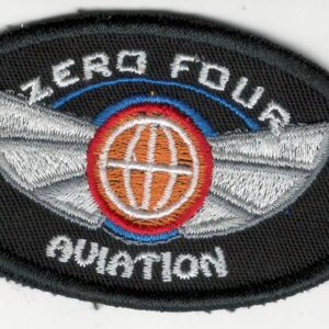 Zero Four Aviation Sew-On Patch Elevate your pilot jacket or flight suit with this high-quality, authentic Zero Four Aviation sew-on patch. Crafted with precision and attention to detail, this patch is a must-have for any aviation enthusiast. Key Features: Unique Design: Showcases the distinctive Zero Four Aviation logo in a stylish and eye-catching design. Durable Construction: Made from top-grade materials to withstand the rigors of flight and frequent wear. Easy to Apply: Features a strong backing for simple and secure sewing attachment to your garment. Versatile: Suitable for a variety of aviation-themed apparel, including pilot jackets, flight suits, and caps. Express Your Passion for Aviation Whether you're a seasoned pilot or simply admire the world of aviation, this Zero Four Aviation sew-on patch is the perfect way to show your love for the sky. Add a touch of personality and style to your flight gear and let the world know that you're a true aviation enthusiast. Don't miss out on this opportunity to own a piece of aviation history. Order your Zero Four Aviation sew-on patch today!