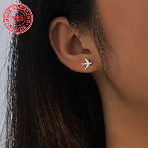925 sterling silver earrings, airplane stud earrings, cubic zirconia earrings, hypoallergenic earrings, silver earrings for women, sterling silver jewelry, fashion jewelry, casual earrings, gift ideas for women, airplane jewelry, aviation jewelry, flight attendant jewelry, pilot jewelry, travel jewelry, minimalist earrings, dainty earrings, stud earrings, silver jewelry gift ideas, sterling silver airplane stud earrings with cubic zirconia, hypoallergenic airplane stud earrings, silver airplane earrings for women, dainty airplane stud earrings, casual silver airplane earrings, best airplane stud earrings, affordable airplane stud earrings, unique airplane stud earrings.